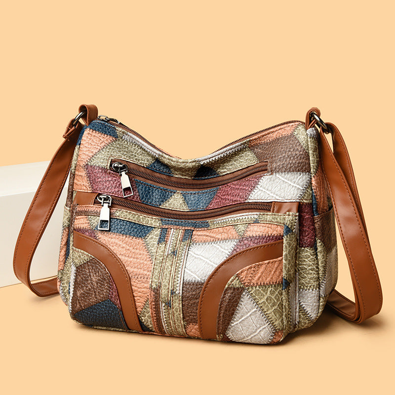 <font dir="auto" style="vertical-align: inherit;"><font dir="auto" style="vertical-align: inherit;">2025 new women's bag messenger bag contrast color fashionable ladies middle-aged mother bag large capacity shoulder bag cross-border wholesale</font></font
