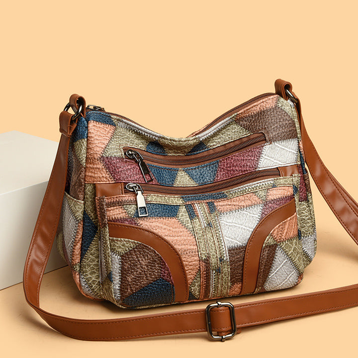 <font dir="auto" style="vertical-align: inherit;"><font dir="auto" style="vertical-align: inherit;">2025 new women's bag messenger bag contrast color fashionable ladies middle-aged mother bag large capacity shoulder bag cross-border wholesale</font></font
