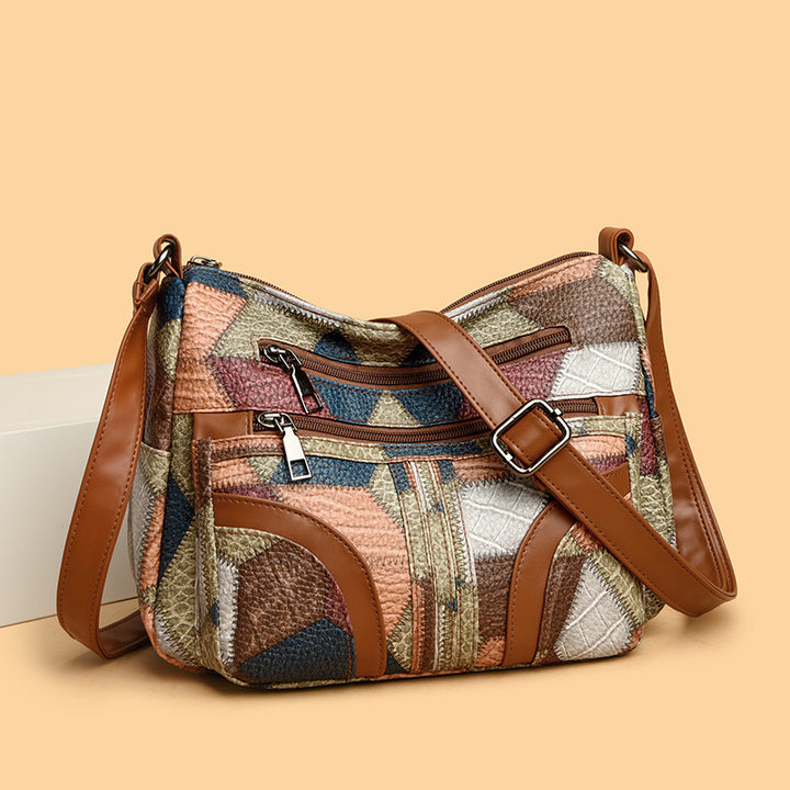 <font dir="auto" style="vertical-align: inherit;"><font dir="auto" style="vertical-align: inherit;">2025 new women's bag messenger bag contrast color fashionable ladies middle-aged mother bag large capacity shoulder bag cross-border wholesale</font></font