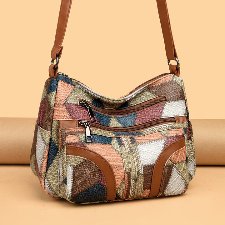 <font dir="auto" style="vertical-align: inherit;"><font dir="auto" style="vertical-align: inherit;">2025 new women's bag messenger bag contrast color fashionable ladies middle-aged mother bag large capacity shoulder bag cross-border wholesale</font></font
